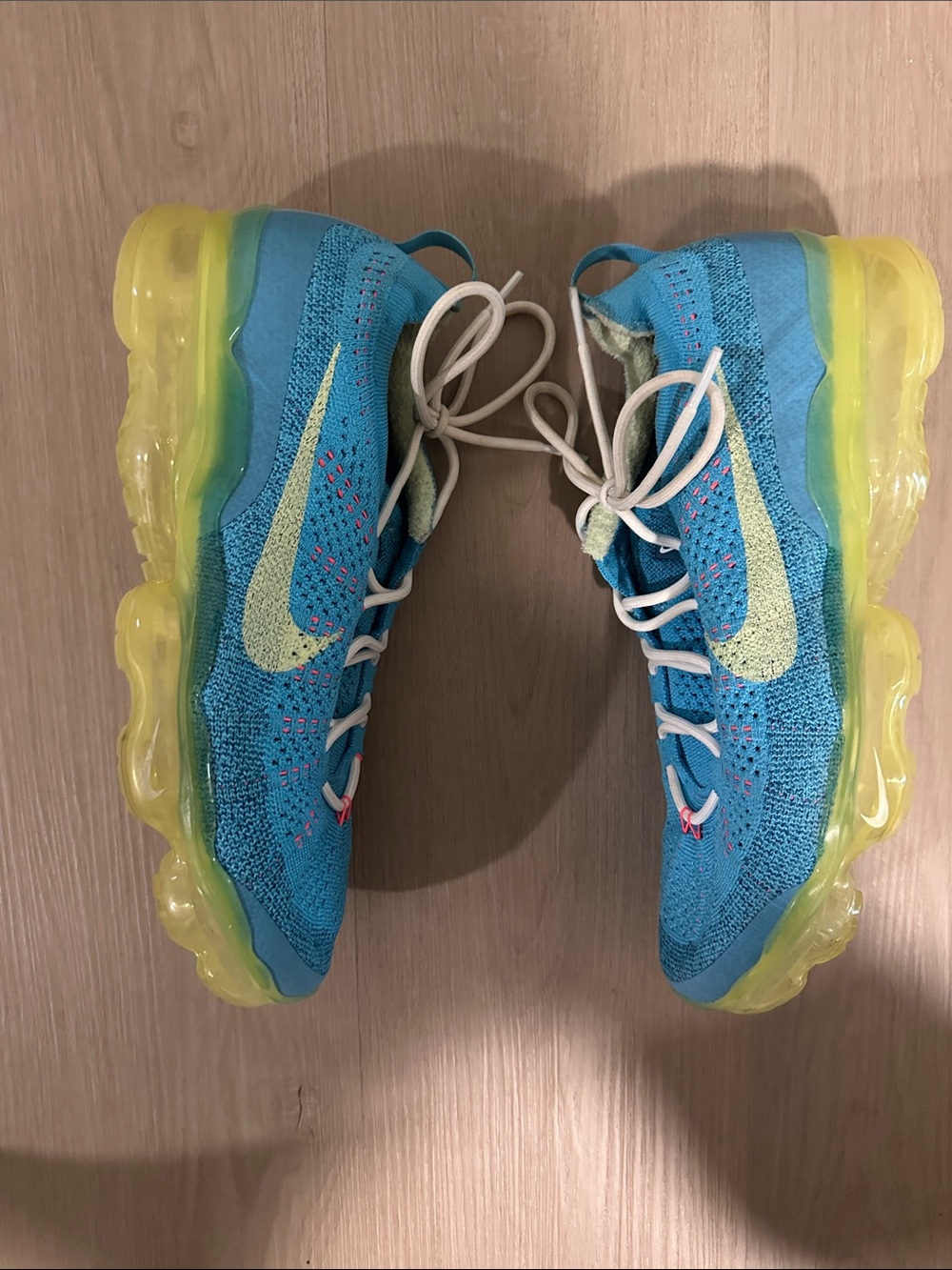 Nike Men’s Turquoise Flyknit Sneakers with Yellow Sole
